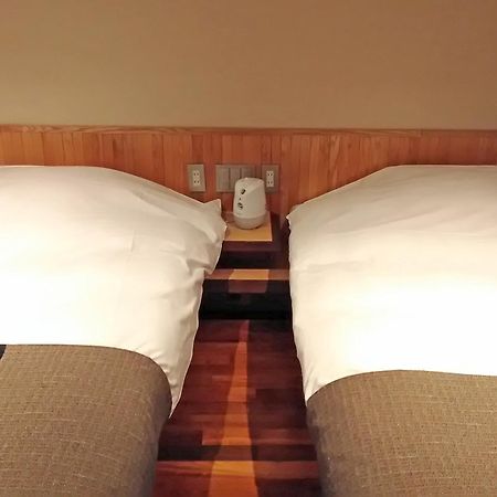 Готель Niseko Konbu Onsen Tsuruga Moku-No-Sho Номер фото