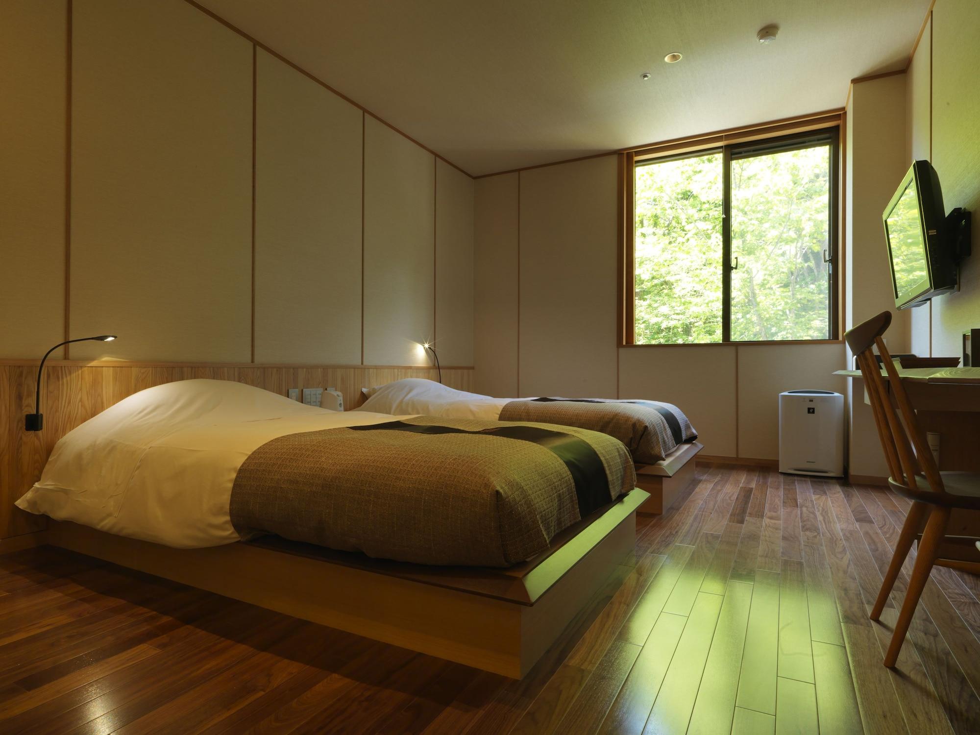 Готель Niseko Konbu Onsen Tsuruga Moku-No-Sho Екстер'єр фото